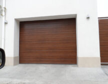 секционные ворота Хьорман М гофр Decograin Dark Oak