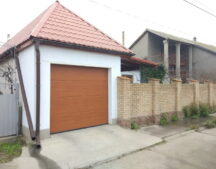 ворота секционные Хьорман М гофр Decograin Golden Oak
